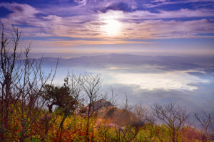 Cliff view of beautiful sunset and sky with sea of mist at Doi L